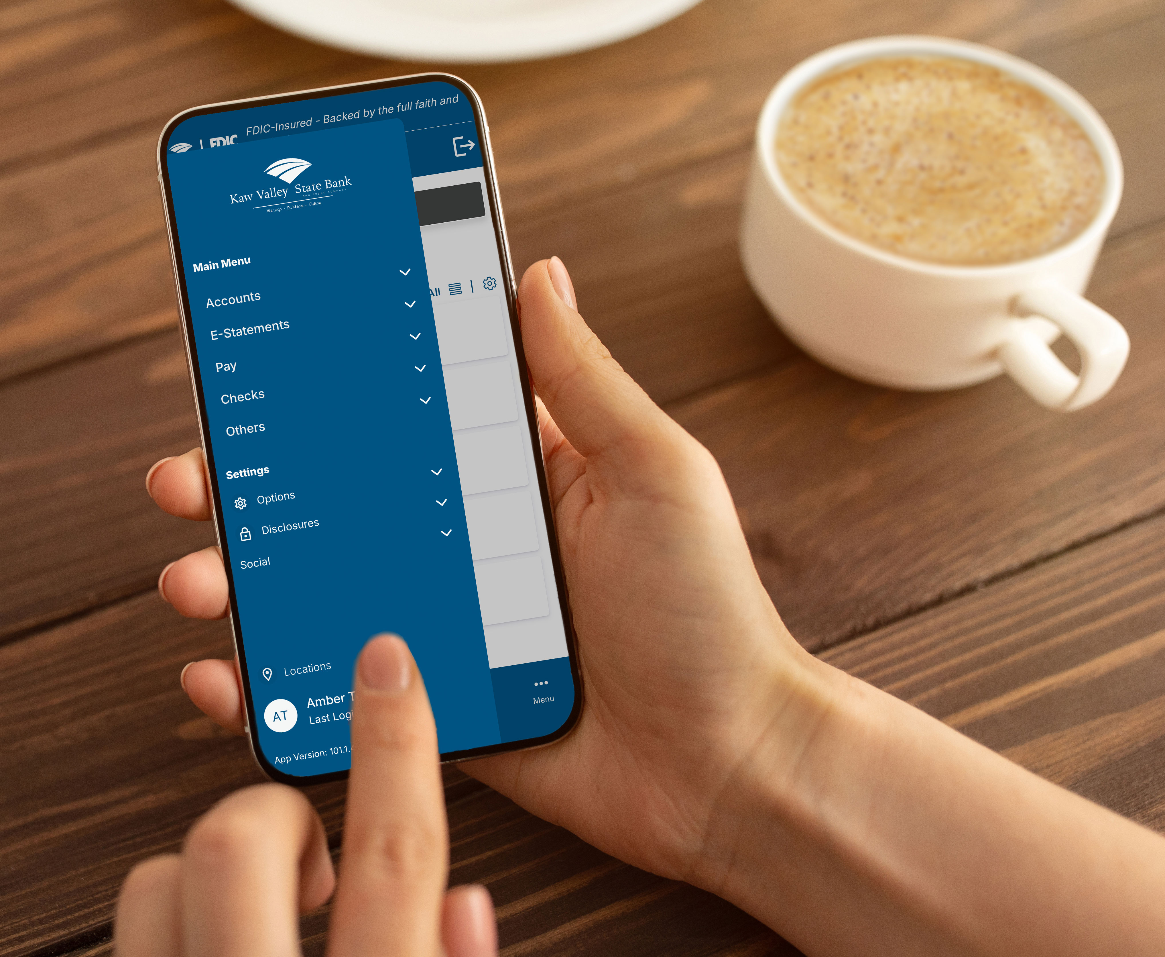 A KSVB customer using their mobile app in the morning while drinking coffee.